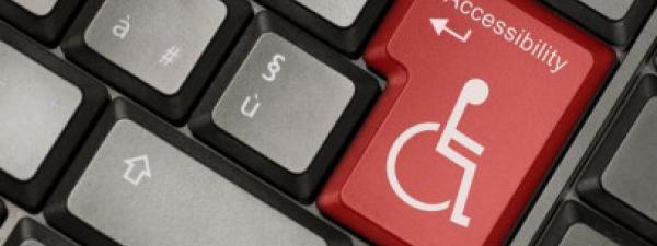 imagen de un teclado con una tecla con el símbolo de la discapacidad