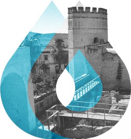 torre de un castillo de málago con el logotipo de la asociación española de drupal encima como marca de agua